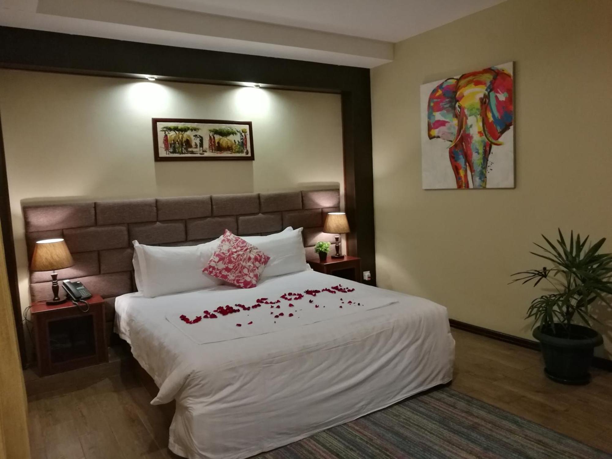 Great Wall Hotel Dar es Salaam Quarto foto
