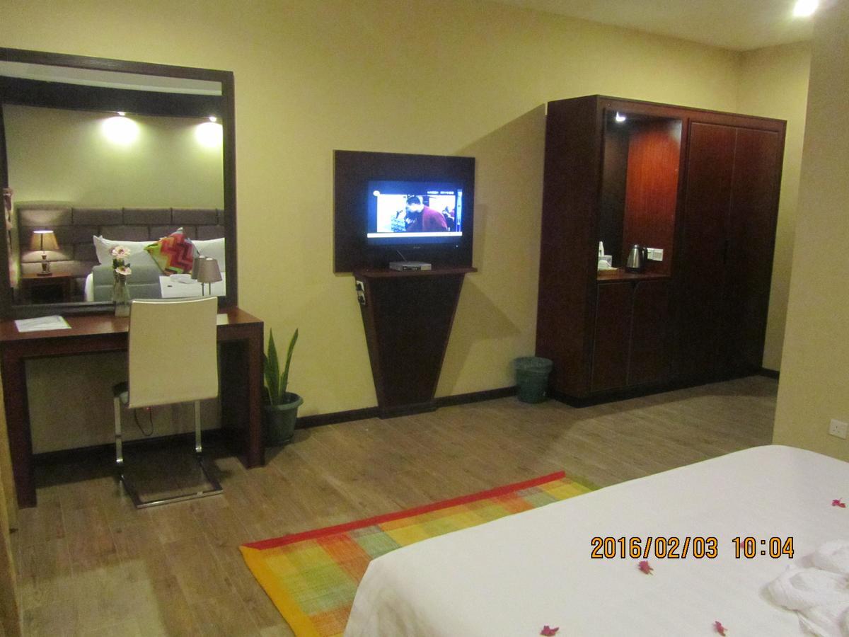 Great Wall Hotel Dar es Salaam Quarto foto