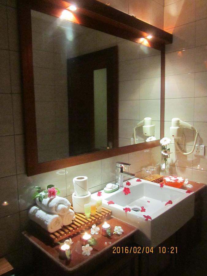 Great Wall Hotel Dar es Salaam Quarto foto