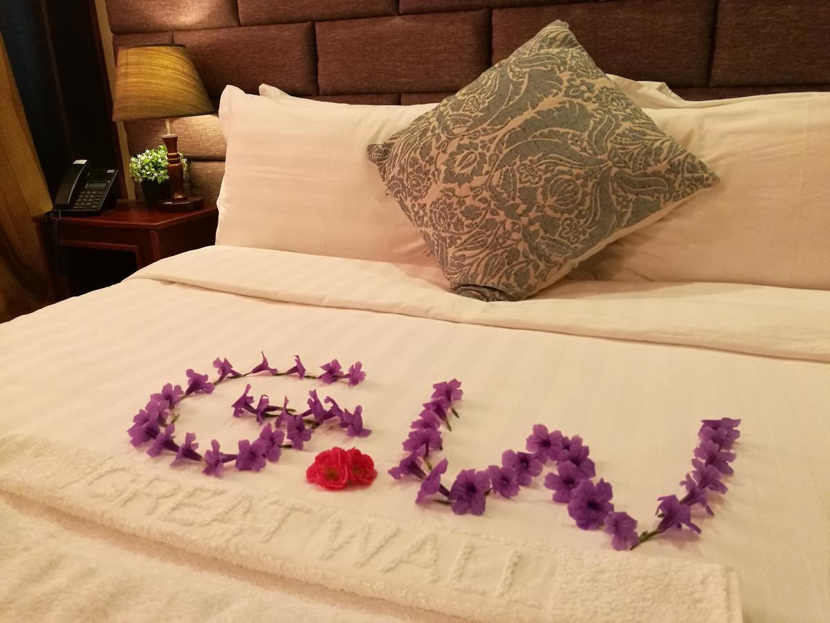 Great Wall Hotel Dar es Salaam Quarto foto