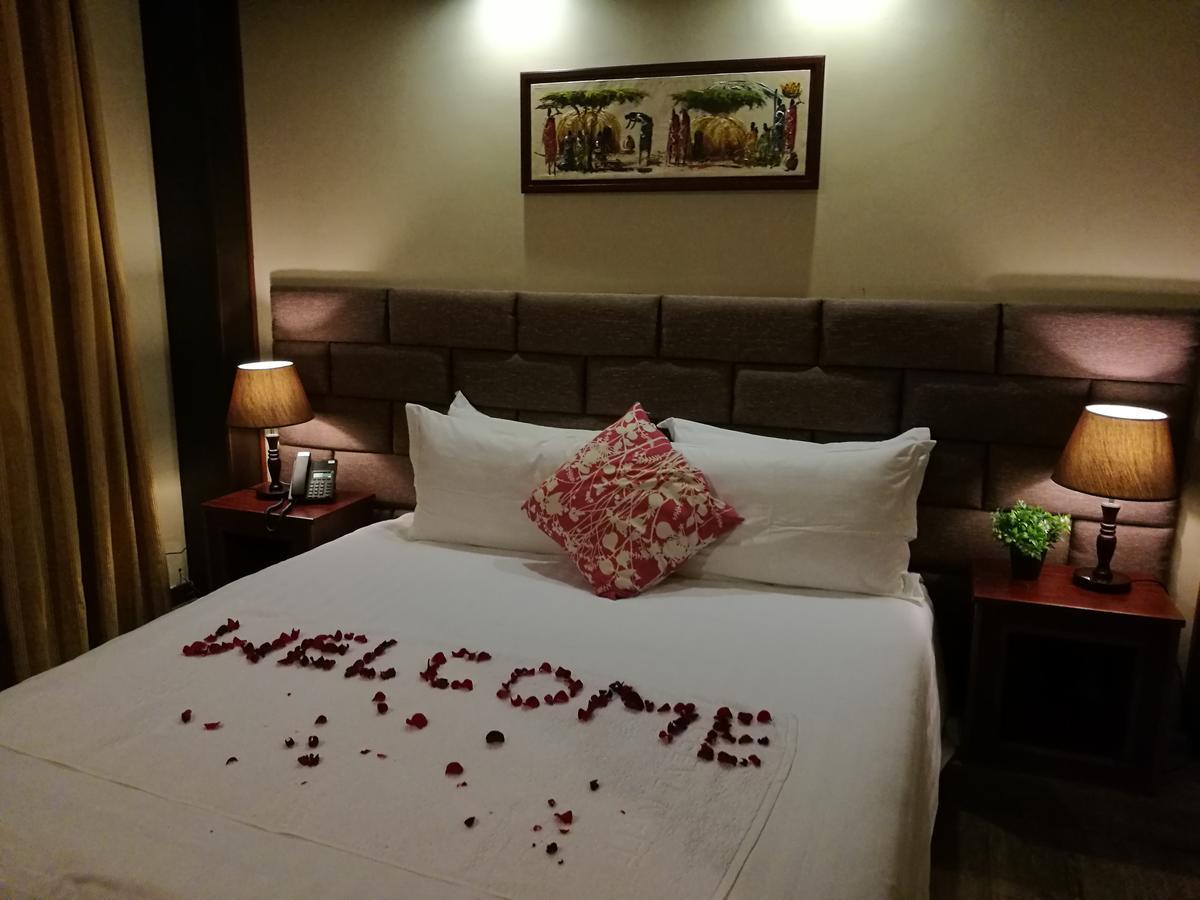 Great Wall Hotel Dar es Salaam Quarto foto